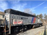 Rear side view of NJT GP40PH-2 # 4102 with the Operation Toys for Tots Banner in Sugar Loaf 